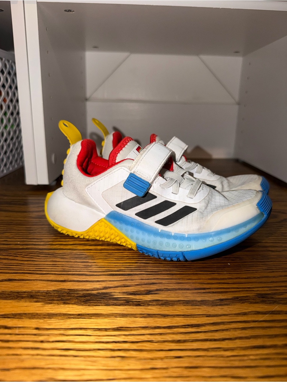 adidas Kids White Sneakers with Blue, Yellow & Red Accents